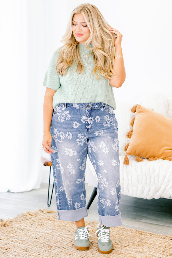 Chic Soul plus size clothing, straight leg jeans with cuffs at the end of each leg and a white floral pattern throughout 