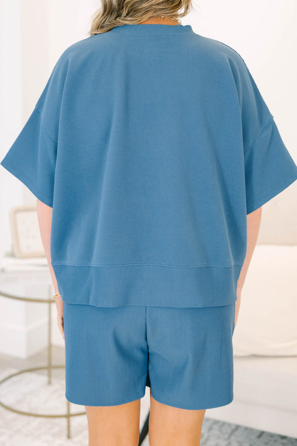 Plus Size blue ribbed two-piece set with a  drop shoulder top and matching shorts.
