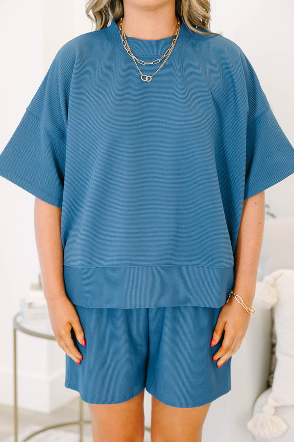 Plus Size blue ribbed two-piece set with a  drop shoulder top and matching shorts.