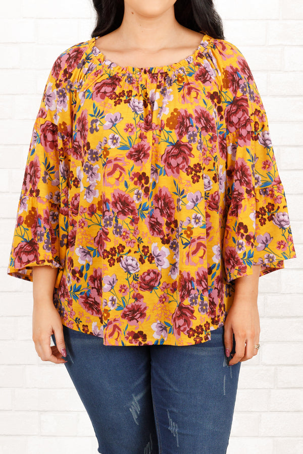 Chic Soul plus size clothing, marigold and mauve floral pattern top with bell sleeves and ruffle details on neckline