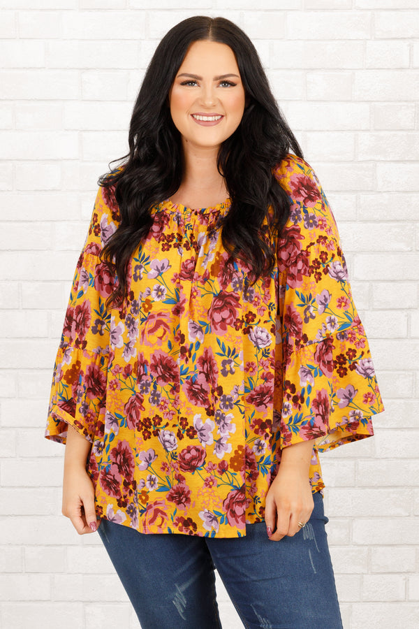 Chic Soul plus size clothing, marigold and mauve floral pattern top with bell sleeves and ruffle details on neckline