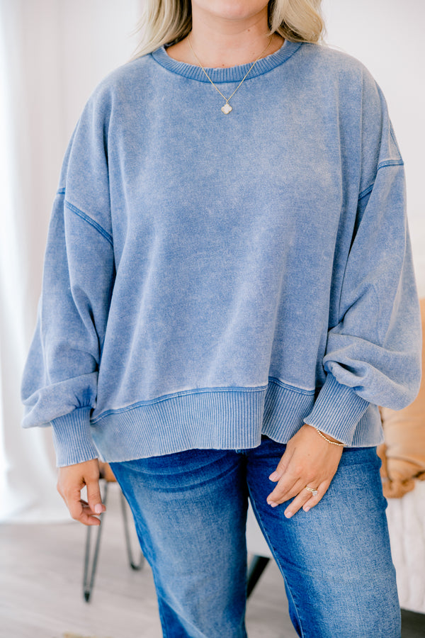 Chic Soul plus size clothing, dusty blue long sleeve pullover with cinched sleeves at the wrist and a loose waistband 