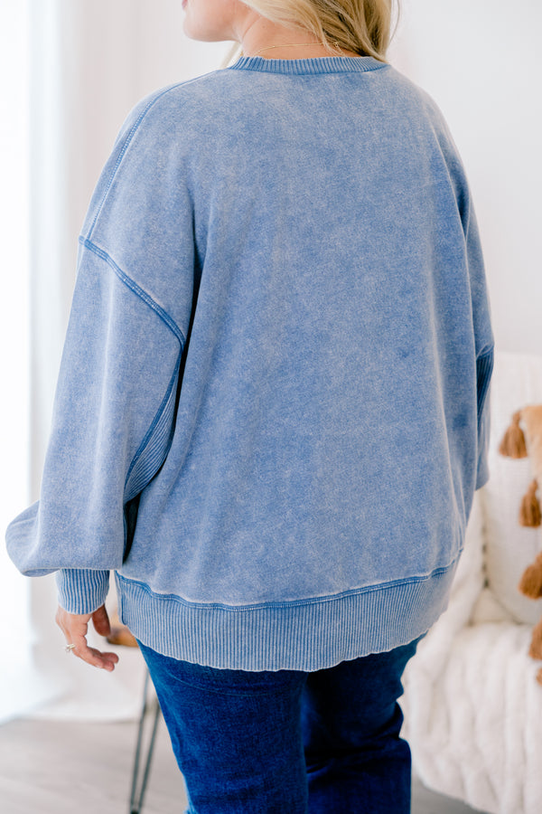 Chic Soul plus size clothing, dusty blue long sleeve pullover with cinched sleeves at the wrist and a loose waistband 