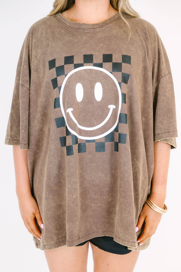 Plus Size mahogany acid wash relaxed tee with a checkered smiley face graphic and black shorts.