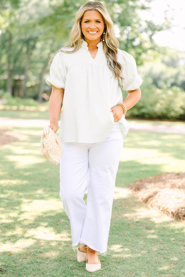 Plus Size green and white gingham top with puff sleeves, a ruffled collar, and a split neckline.