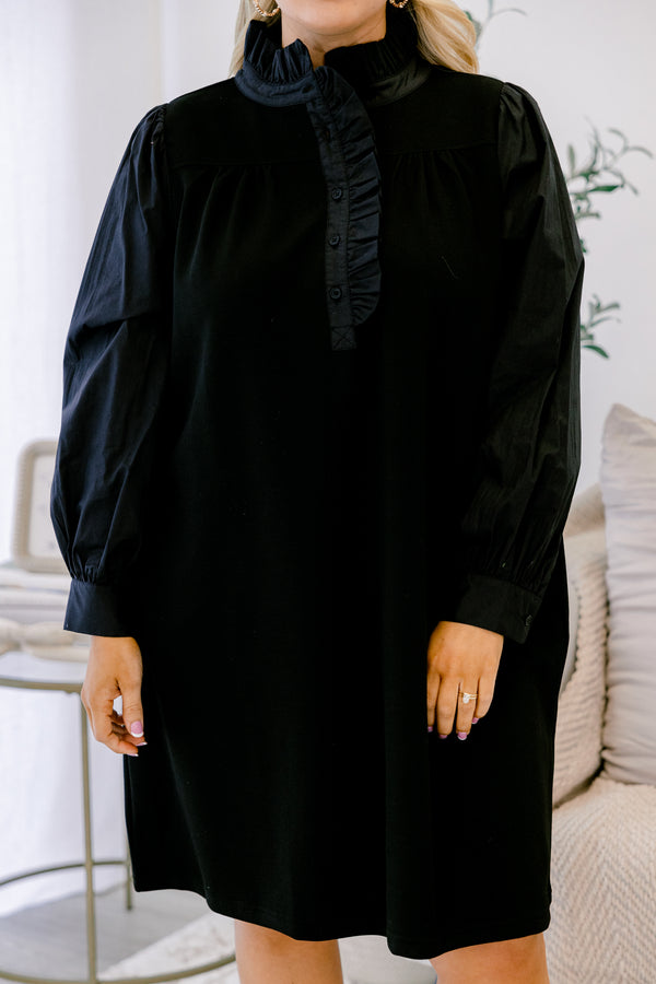 Chic Soul plus size clothing, black long sleeve dress with button details going down to the chest as well as ruffle details going down the neckline 