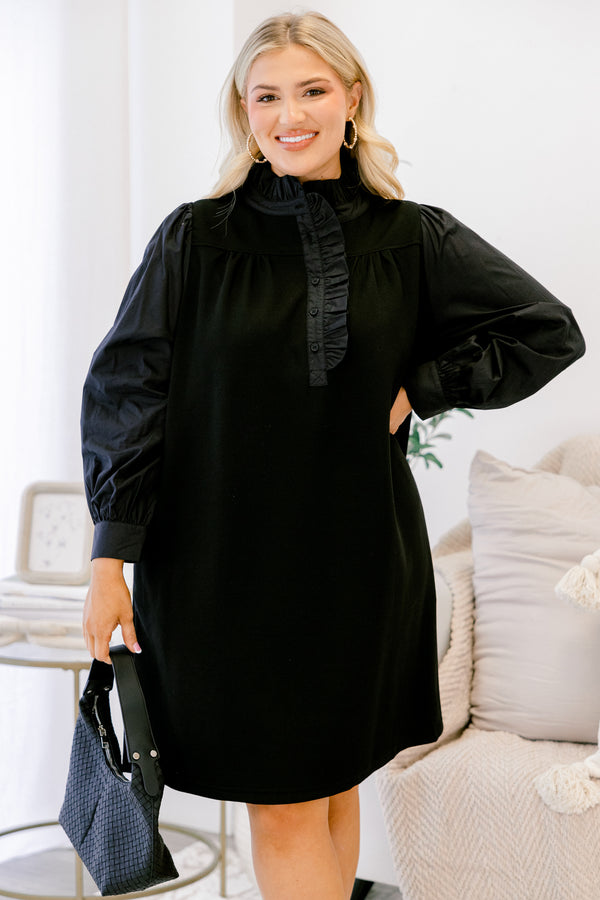 Chic Soul plus size clothing, black long sleeve dress with button details going down to the chest as well as ruffle details going down the neckline 