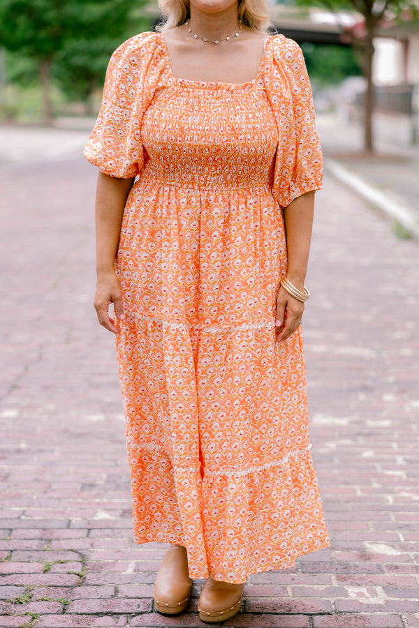 Chic Soul plus size clothing, orange, short sleeve, tiered, maxi dress with white floral block pattern and rouching on the chest .