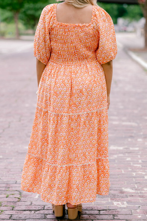Chic Soul plus size clothing, orange, short sleeve, tiered, maxi dress with white floral block pattern and rouching on the chest .