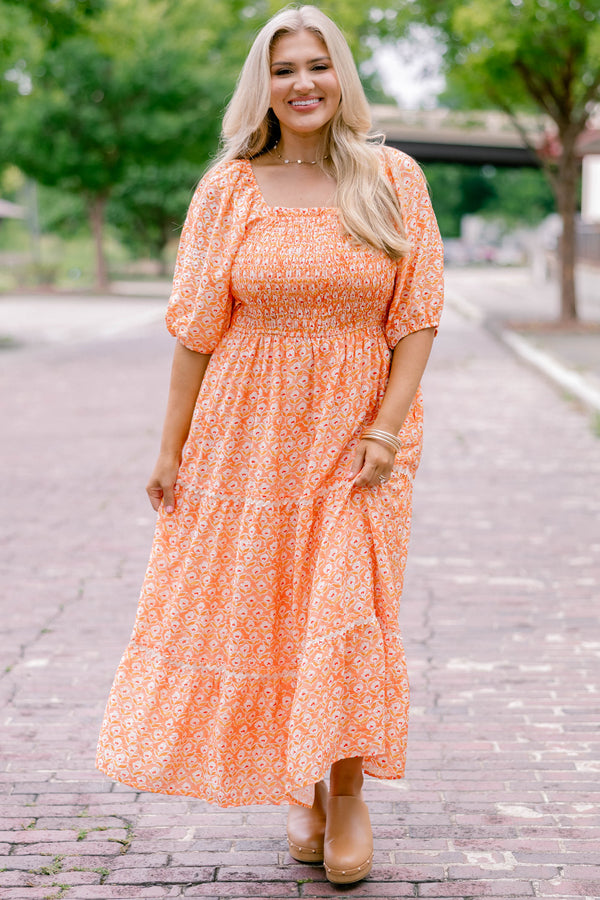 Chic Soul plus size clothing, orange, short sleeve, tiered, maxi dress with white floral block pattern and rouching on the chest .