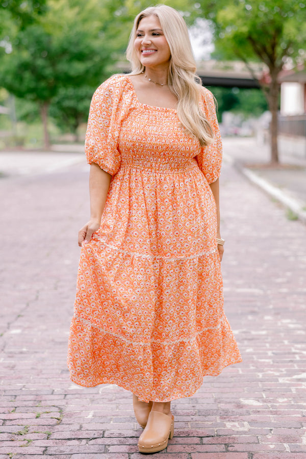 Chic Soul plus size clothing, orange, short sleeve, tiered, maxi dress with white floral block pattern and rouching on the chest .