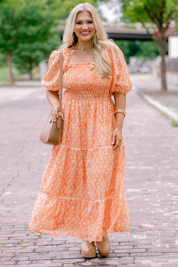 Chic Soul plus size clothing, orange, short sleeve, tiered, maxi dress with white floral block pattern and rouching on the chest .