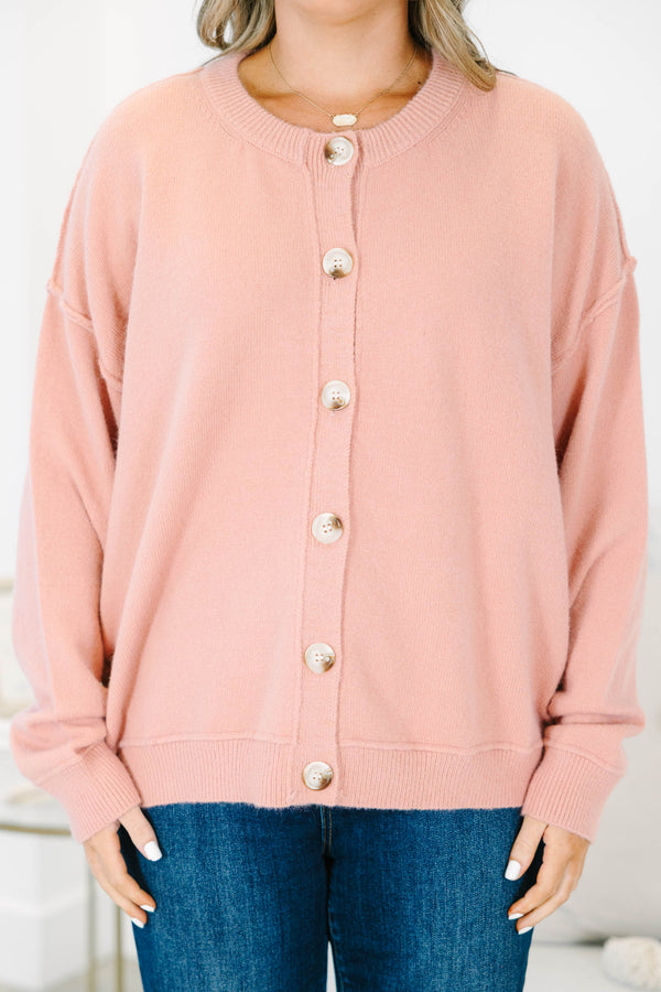 Plus size mauve knit cardigan with a relaxed fit, button-down front, and soft, stretchy fabric.