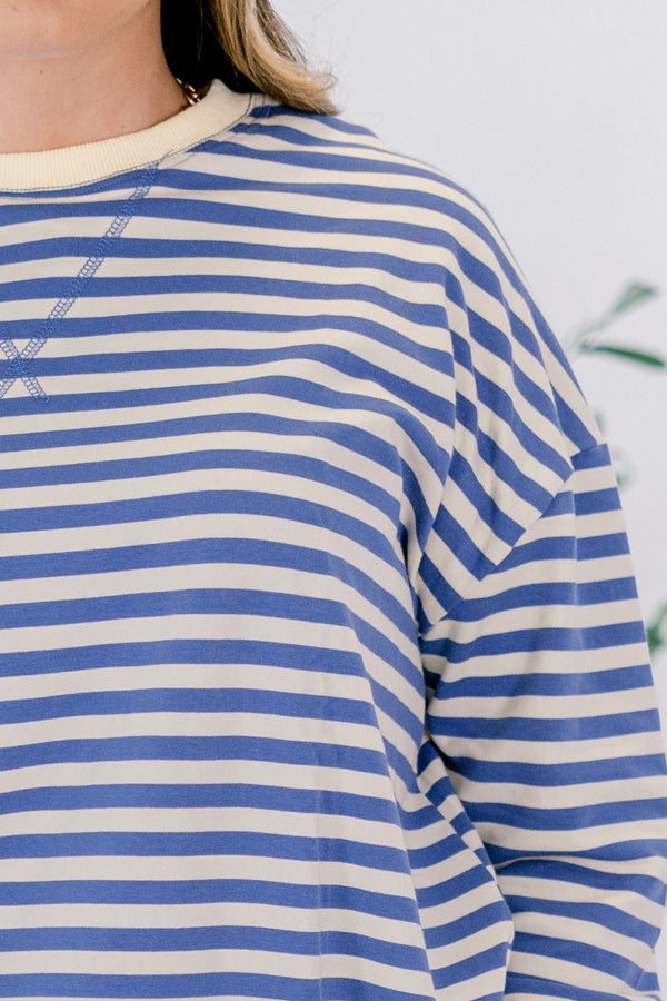 Chic Soul plus size clothing, blue striped pullover with a thick white detail at the bottom of the pullover, end of the sleeves, and around the neckline