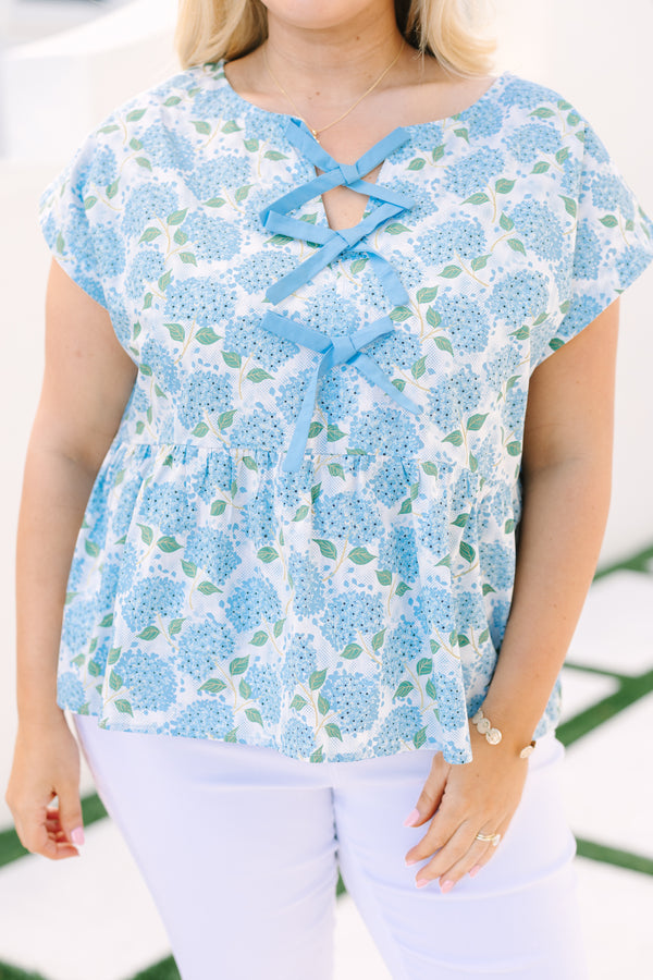 Chic Soul plus size clothing, light blue hydrangea print short sleeve peplum top with 3 bows tying in the middle 