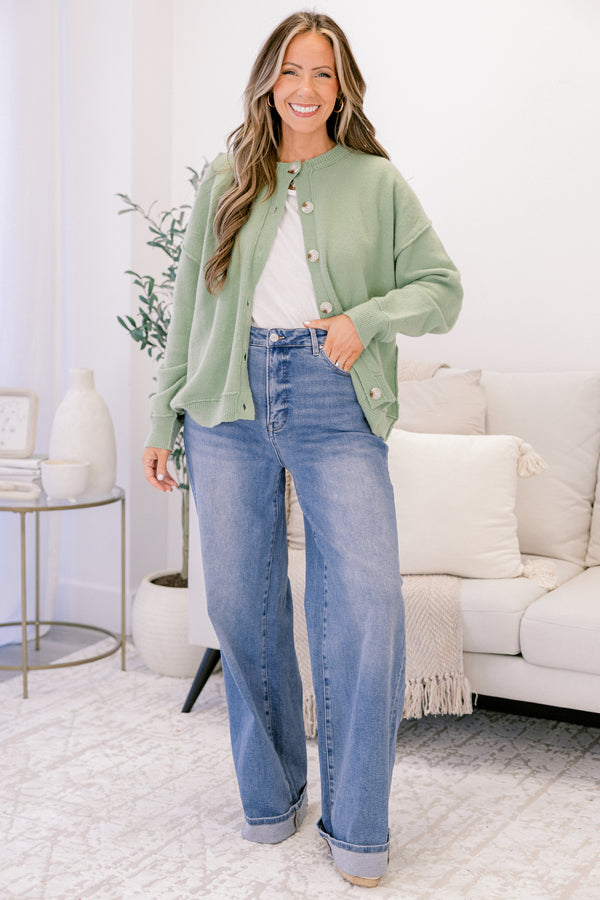 Chic Soul plus size clothing, medium washed jean straight fit jeans with front pockets and a cuff detail at the bottom of each pant leg