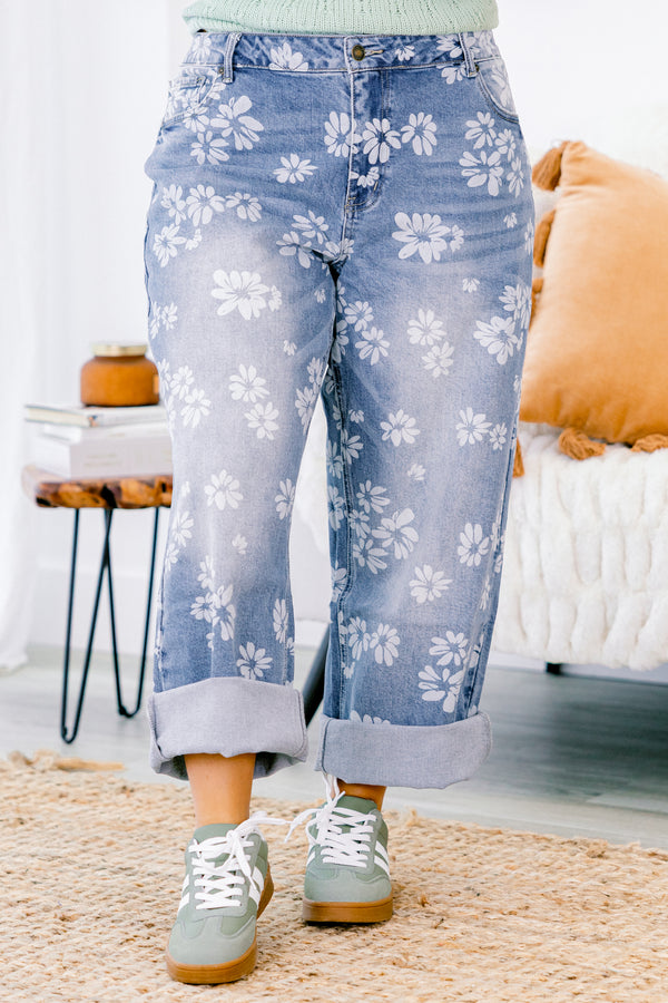 Chic Soul plus size clothing, straight leg jeans with cuffs at the end of each leg and a white floral pattern throughout 