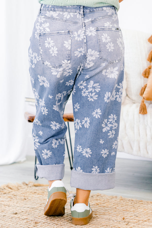 Chic Soul plus size clothing, straight leg jeans with cuffs at the end of each leg and a white floral pattern throughout 