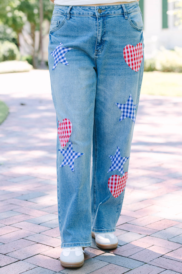 Plus Size straight leg jeans in light wash denim with red and blue gingham heart and star patches.