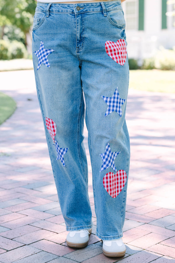 Plus Size straight leg jeans in light wash denim with red and blue gingham heart and star patches.