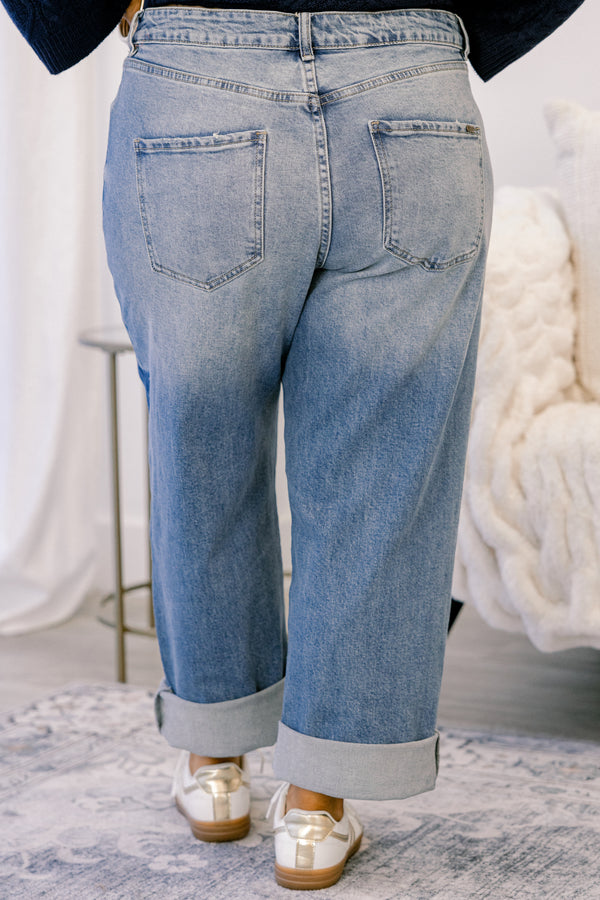 Chic Soul plus size clothing, medium washed jeans with dark denim star patches throughout the jeans as well as cuffs at the end of each pant leg