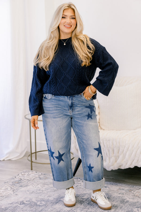 Chic Soul plus size clothing, medium washed jeans with dark denim star patches throughout the jeans as well as cuffs at the end of each pant leg