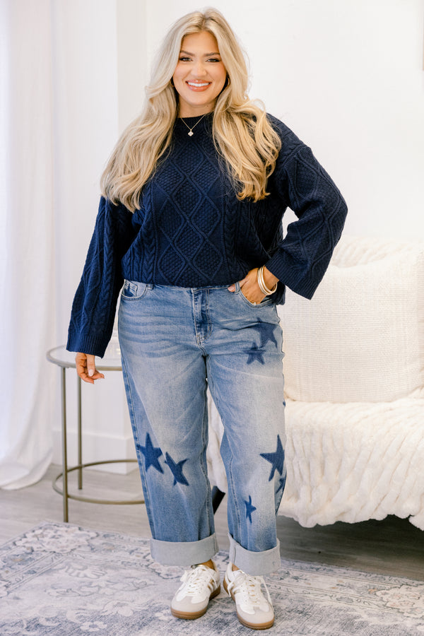 Chic Soul plus size clothing, medium washed jeans with dark denim star patches throughout the jeans as well as cuffs at the end of each pant leg