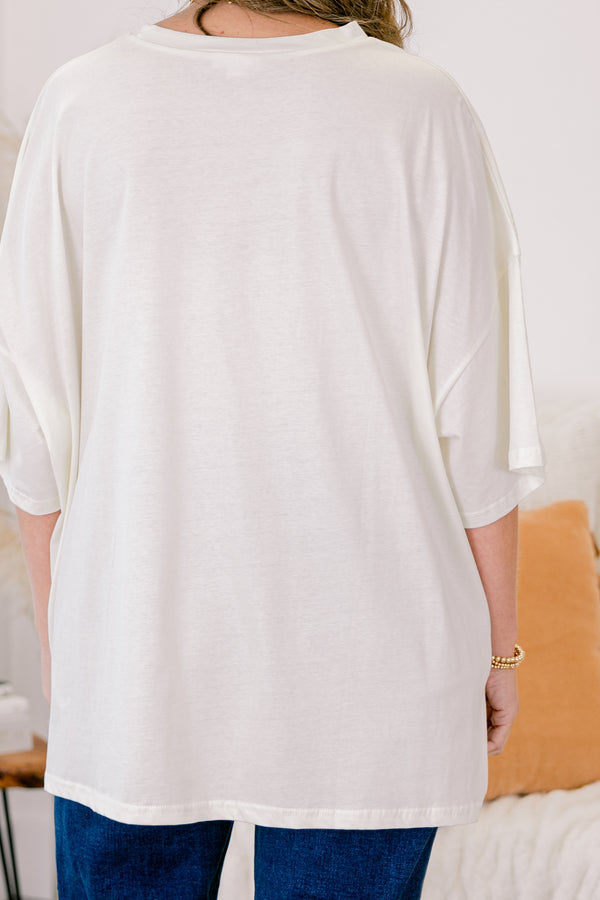 Chic Soul plus size clothing, ivory short sleeve boyfriend tee with patchwork pumpkin in the middle and a bow on the stem