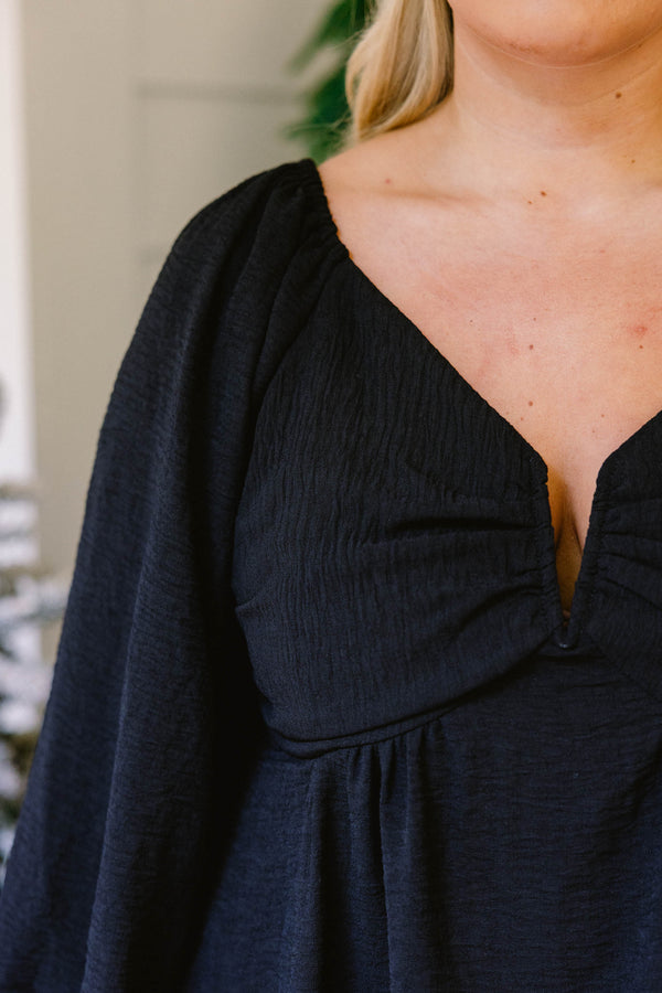 Chic Soul plus size clothing, black long sleeve babydoll top with cinched sleeves and v-neckline 