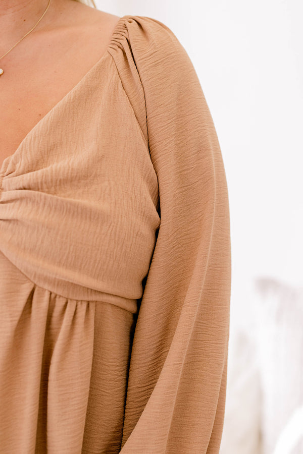 Chic Soul plus size clothing, light brown long sleeve flowy blouse with ruffles at the end of the sleeves and a v neckline
