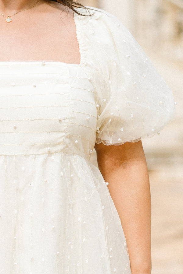 Chic Soul plus size clothing,  short-sleeve cream puffed baby doll dress with square neckline and puffed sleeves with pearls spotted across the dress