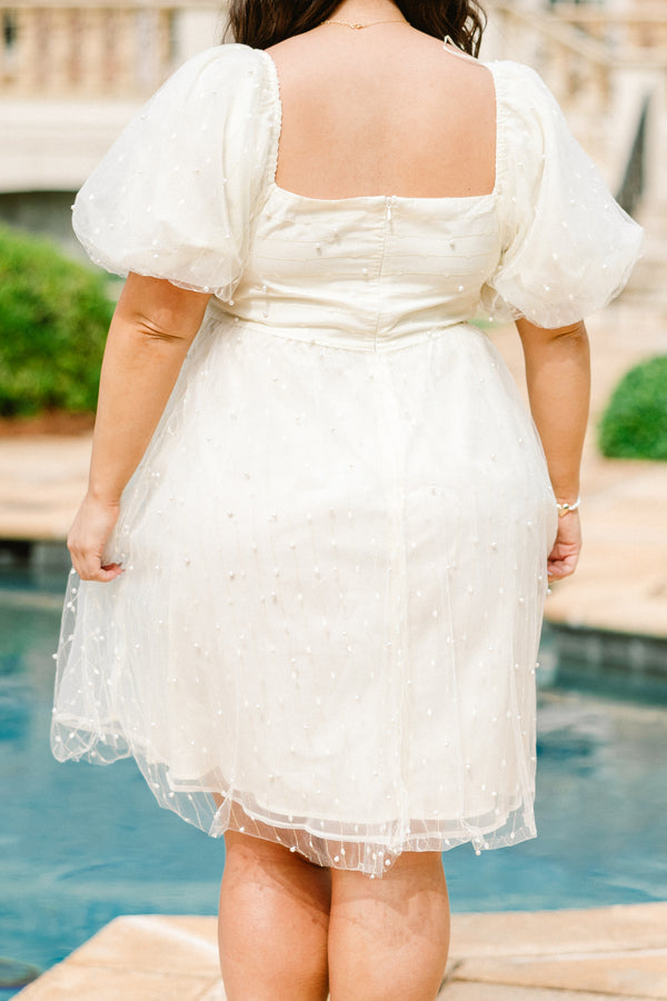 Chic Soul plus size clothing,  short-sleeve cream puffed baby doll dress with square neckline and puffed sleeves with pearls spotted across the dress