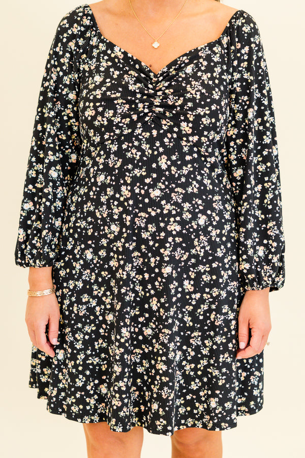 quarter-bubble-sleeve black dress with sweetheart-neckline and multi-colored subtle floral pattern detailing