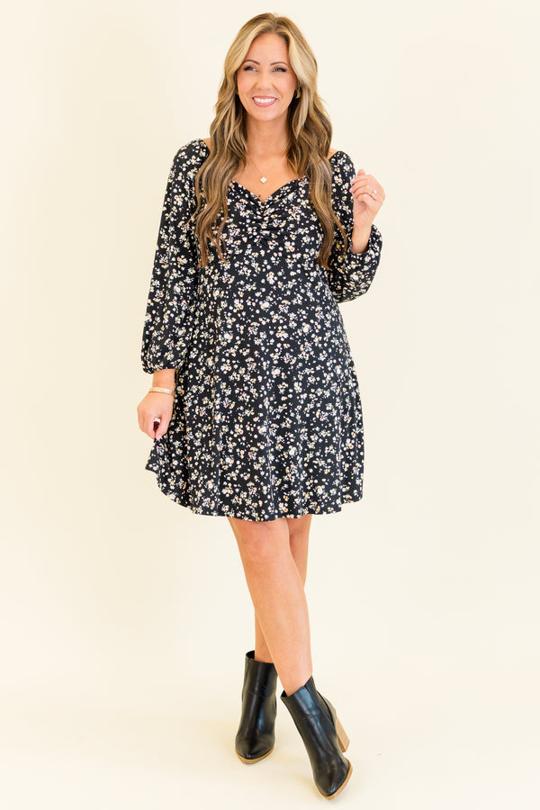 quarter-bubble-sleeve black dress with sweetheart-neckline and multi-colored subtle floral pattern detailing