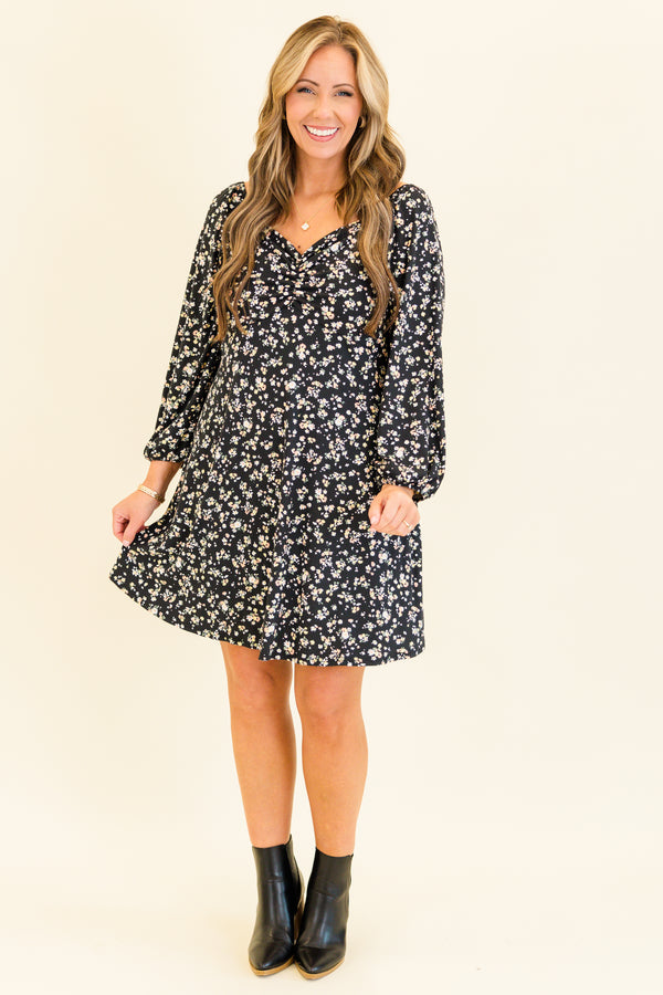 quarter-bubble-sleeve black dress with sweetheart-neckline and multi-colored subtle floral pattern detailing