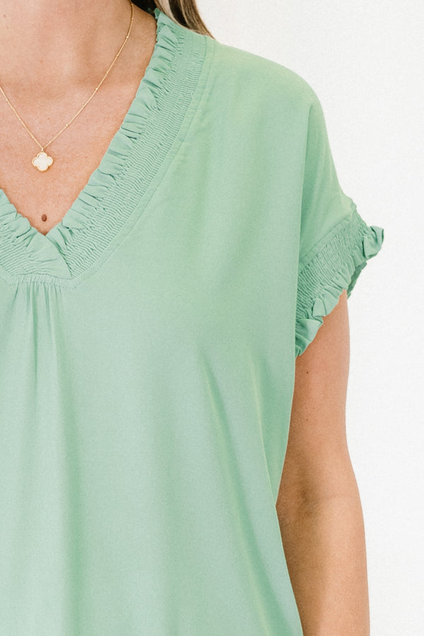 Chic Soul plus size clothing, sage short sleeve plain top with v neckline with ruffle detail along edges of neckline and sleeves