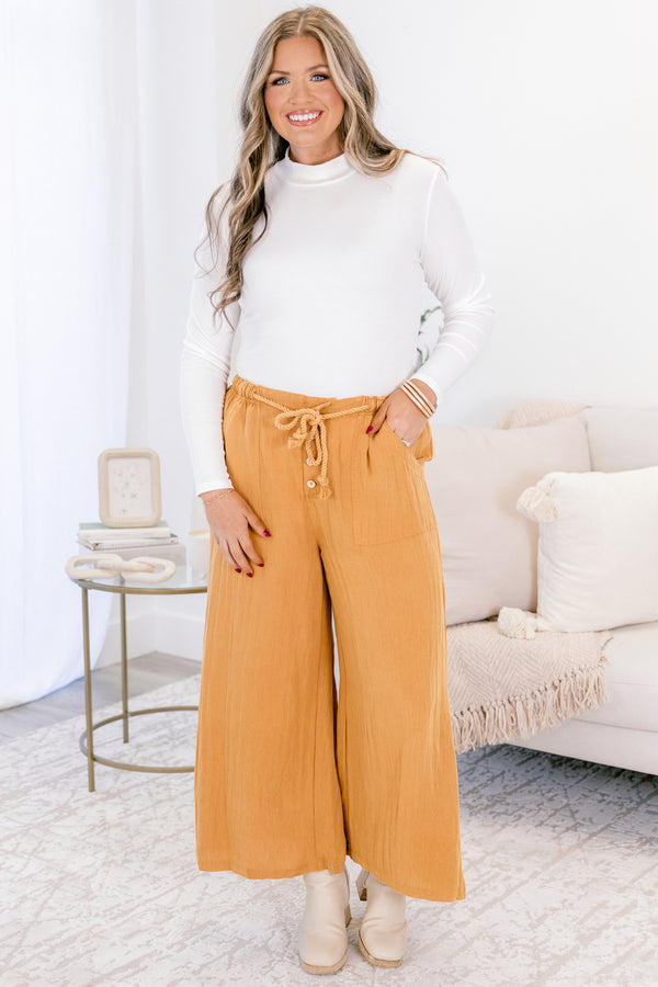 Chic Soul plus size clothing, ochre yellow flowy wide pants with shoelace tie around waist and three button fly
