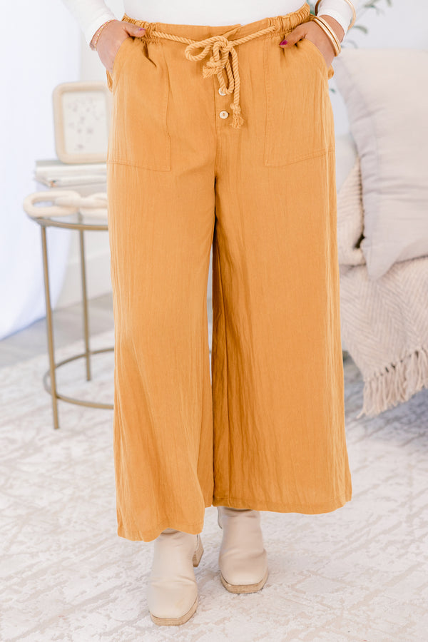 Chic Soul plus size clothing, ochre yellow flowy wide pants with shoelace tie around waist and three button fly