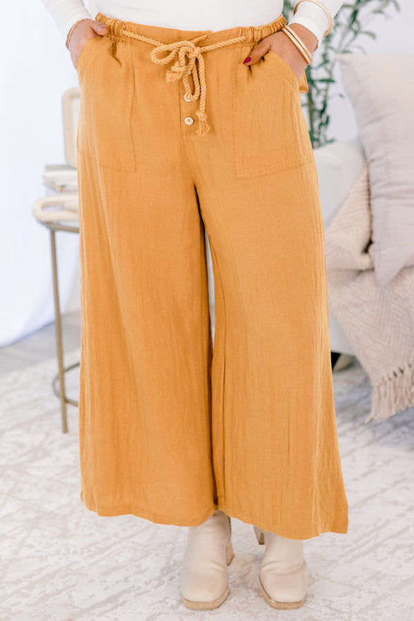 Chic Soul plus size clothing, ochre yellow flowy wide pants with shoelace tie around waist and three button fly