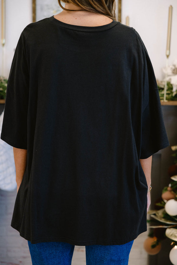 Chic Soul plus size clothing, black short sleeve boyfriend tee with text “mama” in the center with leopard print inside text and christmas tree with bow at the top in the middle of the “mama” text