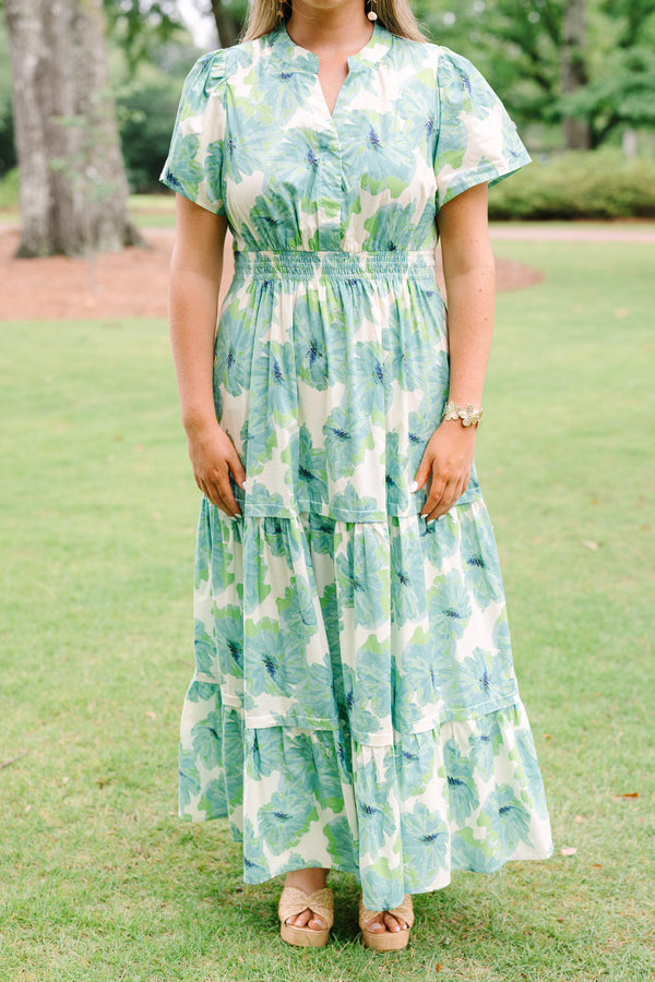 Chic Soul plus size clothing, short-sleeve green maxi dress with a smocked waistline and a watercolor floral print with a tiered skirt and a v-neckline