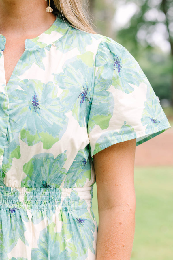 Chic Soul plus size clothing, short-sleeve green maxi dress with a smocked waistline and a watercolor floral print with a tiered skirt and a v-neckline