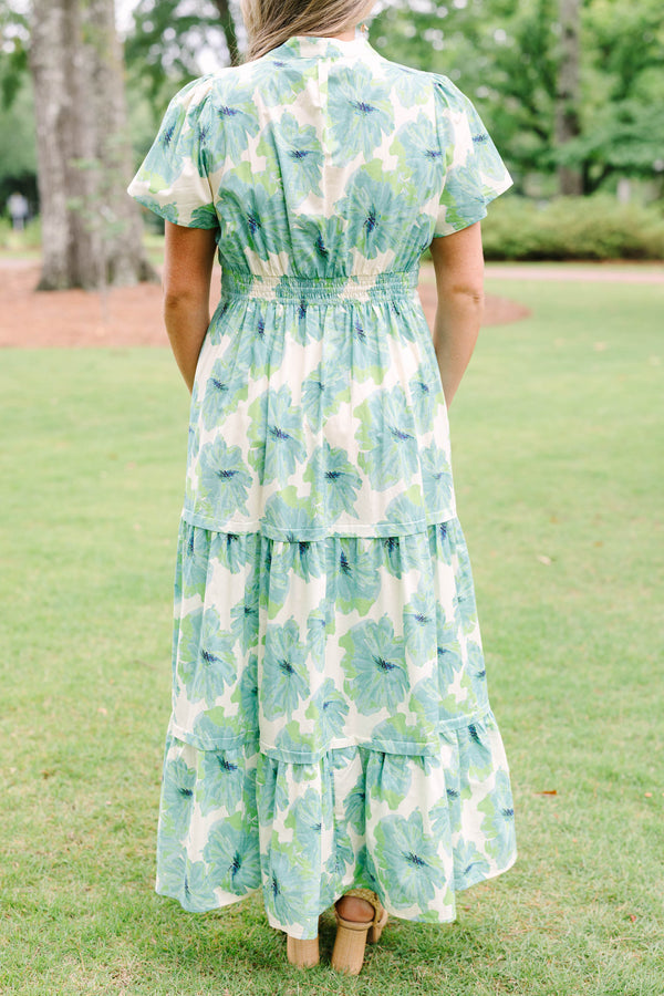 Chic Soul plus size clothing, short-sleeve green maxi dress with a smocked waistline and a watercolor floral print with a tiered skirt and a v-neckline