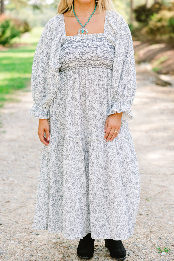 Chic Soul plus size clothing, white maxi dress with a dainty black floral pattern and long sleeves that have a small ruffle detail at the end of the sleeves as well as a square neckline  