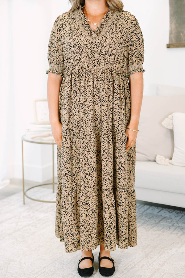 Plus Size cream tiered maxi dress with black micro-dot print, puff sleeves, and a v-neckline.