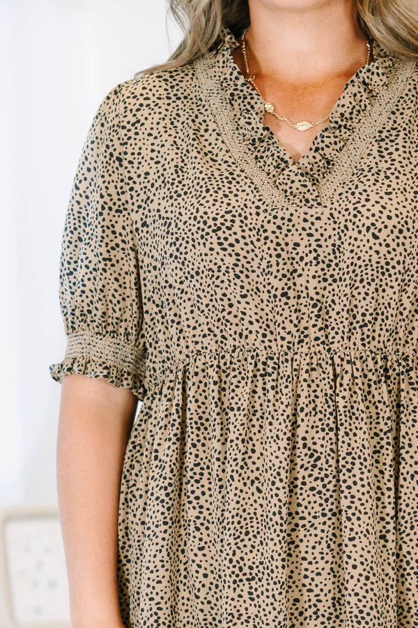 Plus Size cream tiered maxi dress with black micro-dot print, puff sleeves, and a v-neckline.