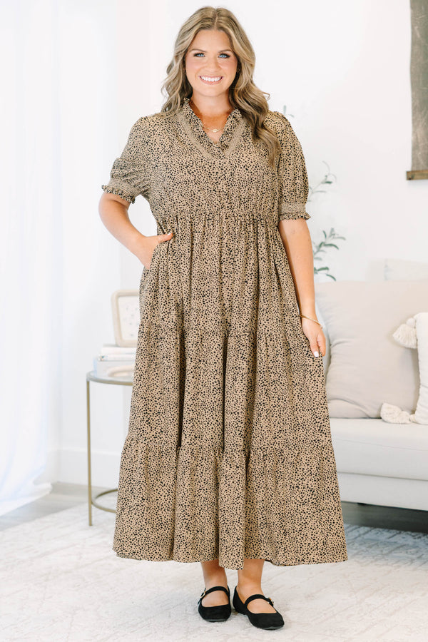 Plus Size cream tiered maxi dress with black micro-dot print, puff sleeves, and a v-neckline.