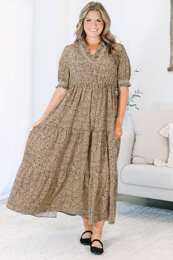 Plus Size cream tiered maxi dress with black micro-dot print, puff sleeves, and a v-neckline.