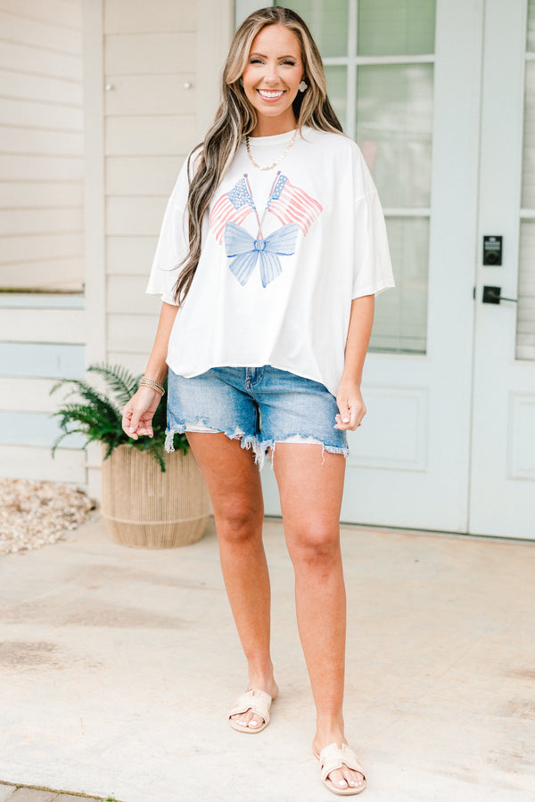 Chic Soul plus size clothing, white vintage washed tee with two American flags in a light blue bow graphic