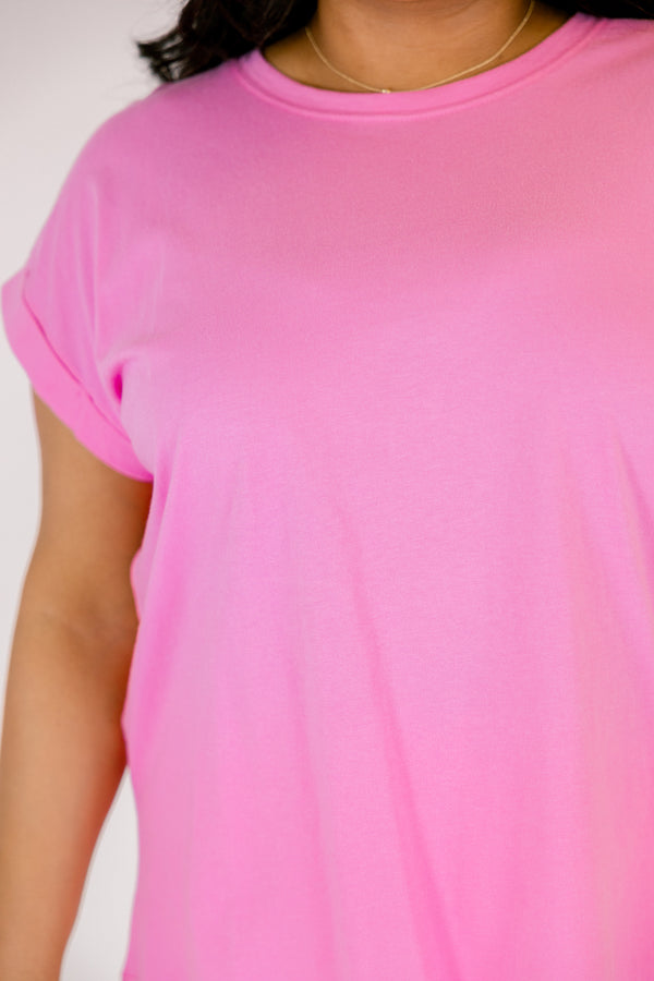 candy pink tee with cuffed short sleeves and a round neckline